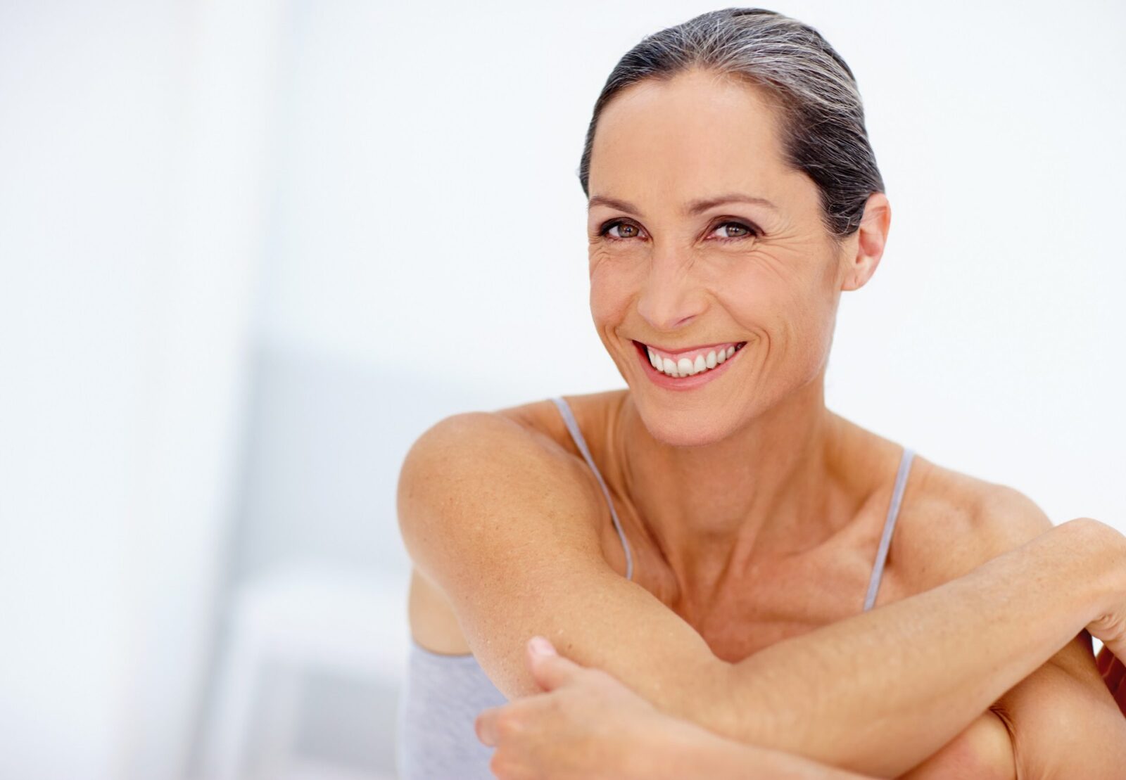 Cropped portrait of a beautiful mature woman posing in studio